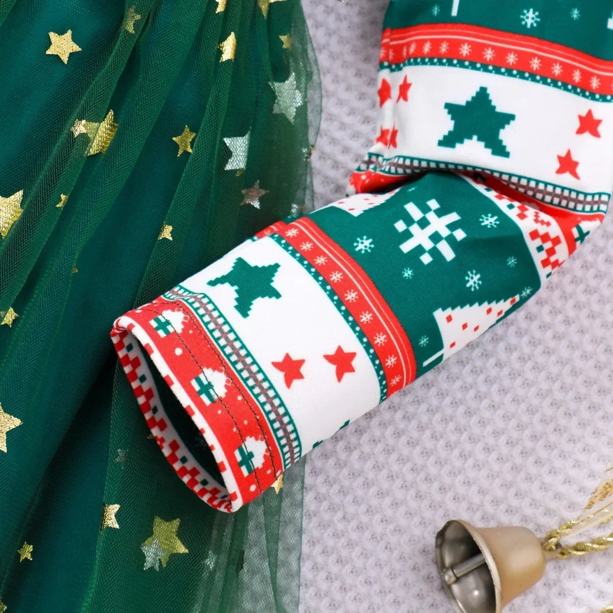 long sleeve detail of girls christmas bow dress showing cozy fit for winter celebrations